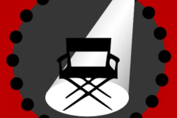 An image of a cartoon director's chair sitting empty in a spotlight with a red border